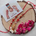 Red Shell Rakhi and Lumba Set